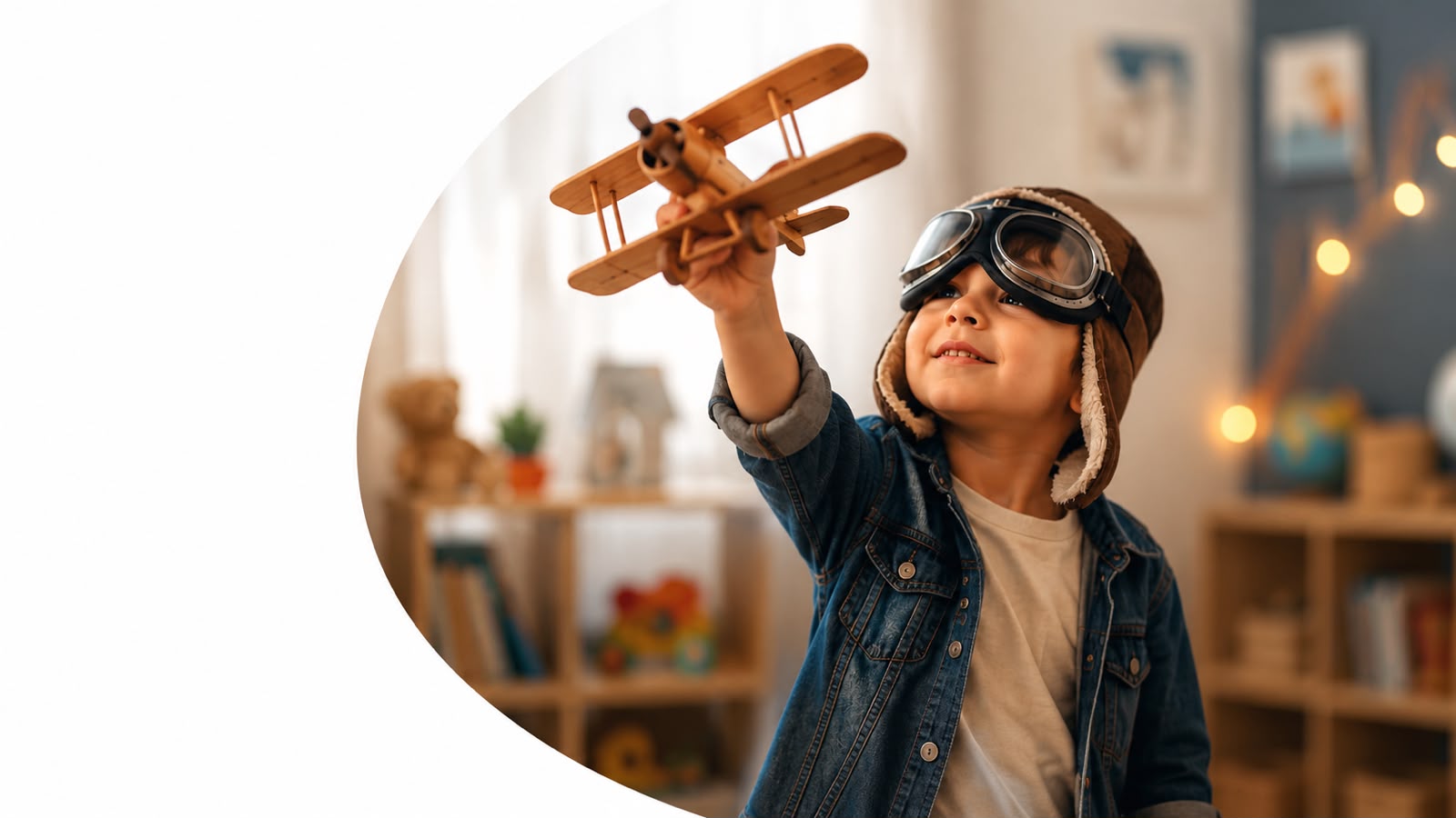 Child playing with a wooden toy airplane